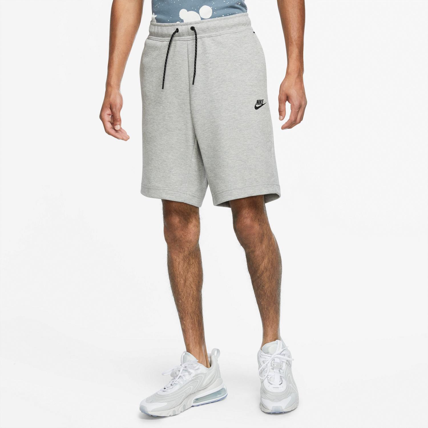Nike pantalon gris hombre |